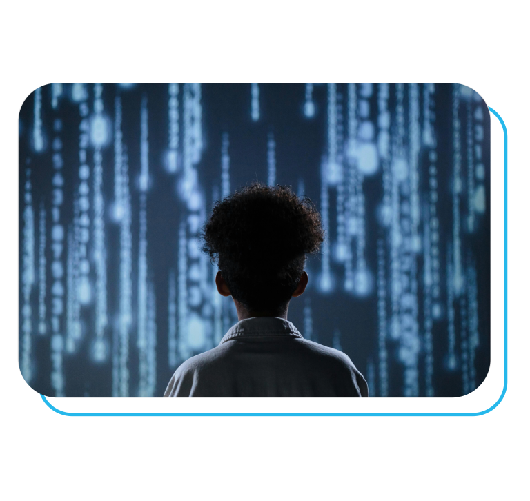 A child standing in front of a digital screen filled with glowing data streams, symbolizing the intersection of emotional intelligence and artificial intelligence in the modern classroom.
