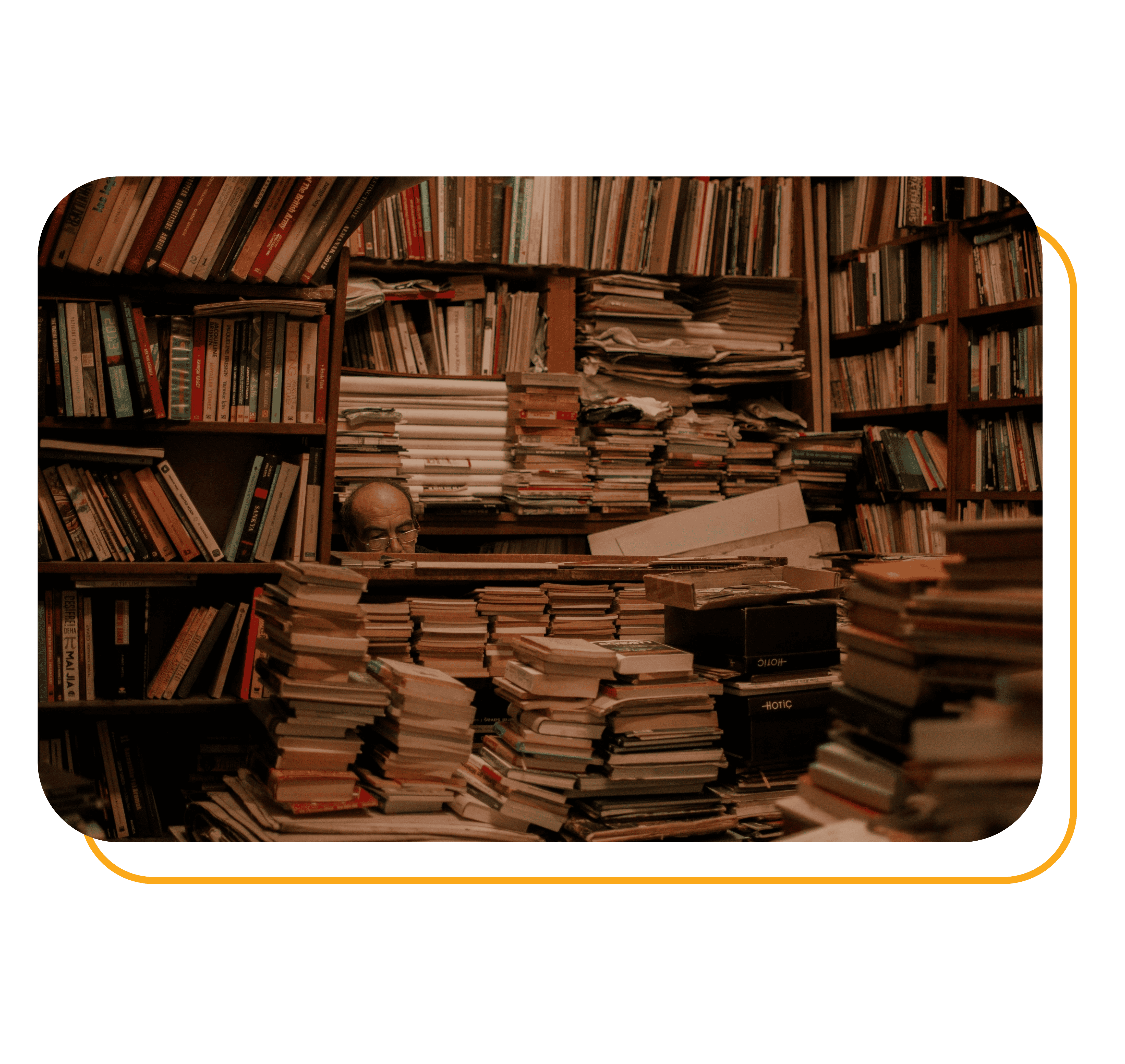 A room overwhelmed with books and papers stacked high, representing hoarding behavior.